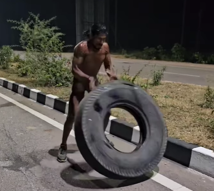 Desi Tarzan Flip Tire During Workout