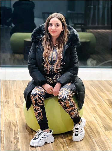 Hareem Shah lounging on beanbag