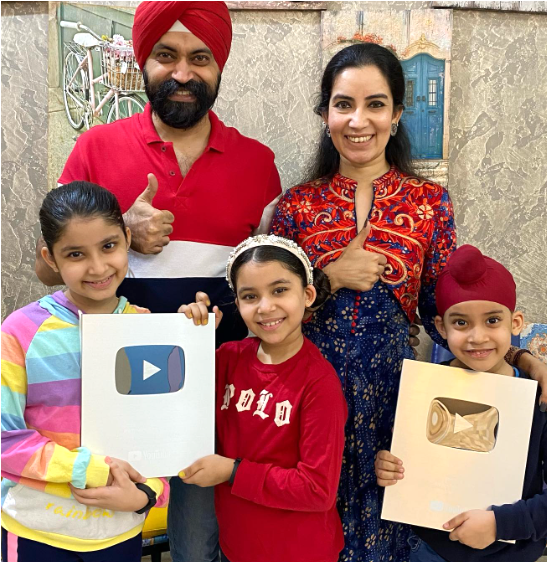 Ramneek and family happily accepting awards