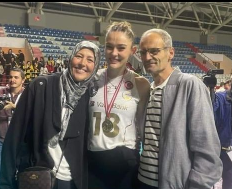 Mother (L) Muslim Attire, Father (R)